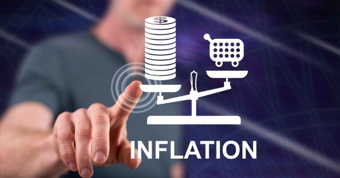 Man touching an inflation concept on a touch screen with his finger